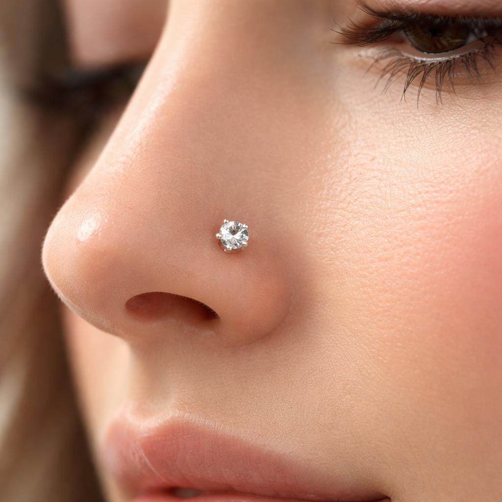 Clear gem nostril stud in a nose piercing